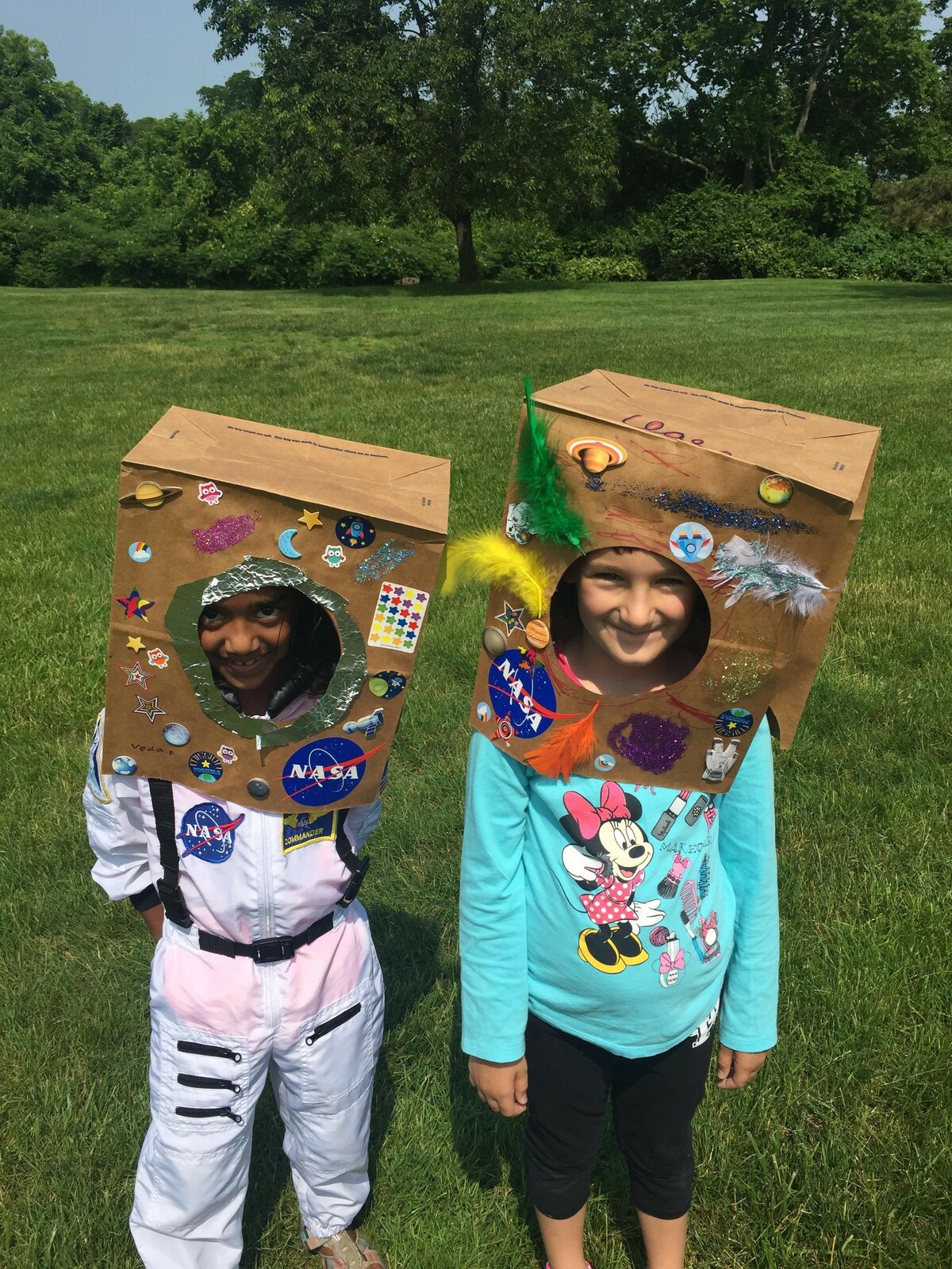 Kids in paper space helmets